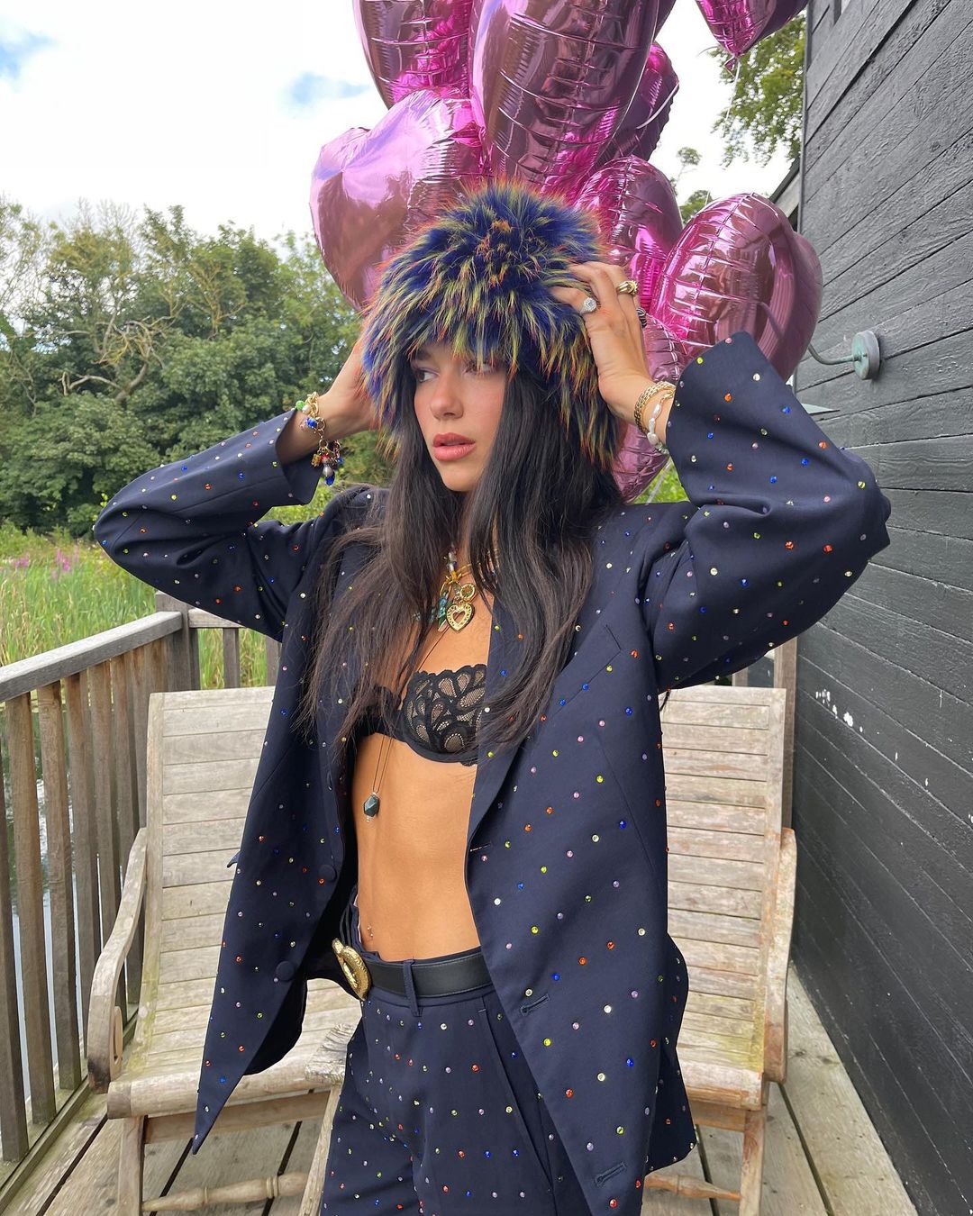 Dua Lipa mừng sinh nhật đúng chất cung Sư Tử với blazer pha lê và bikini ren