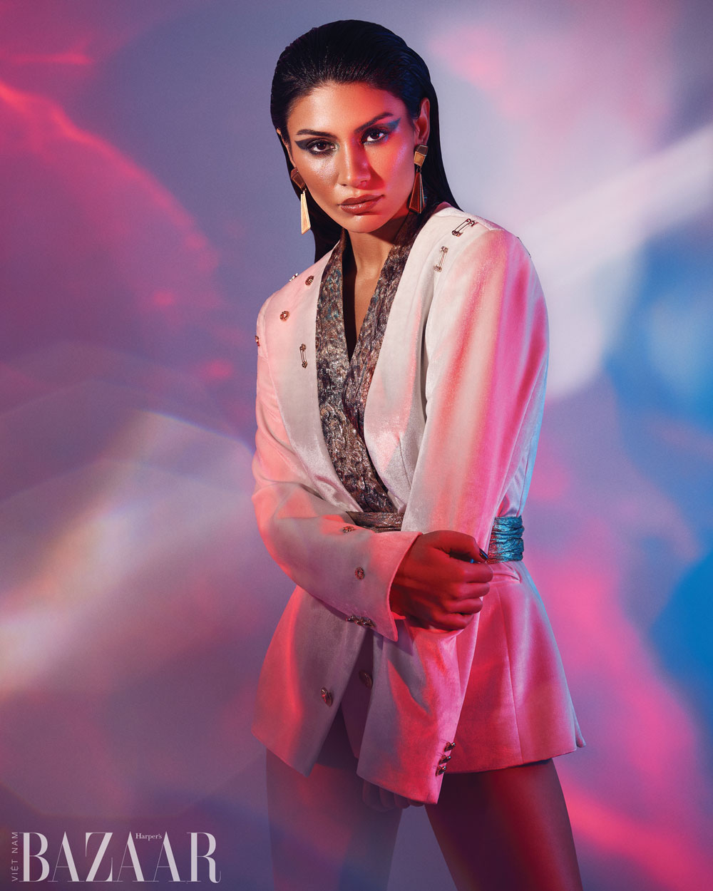 Selen in white blazer outfit.