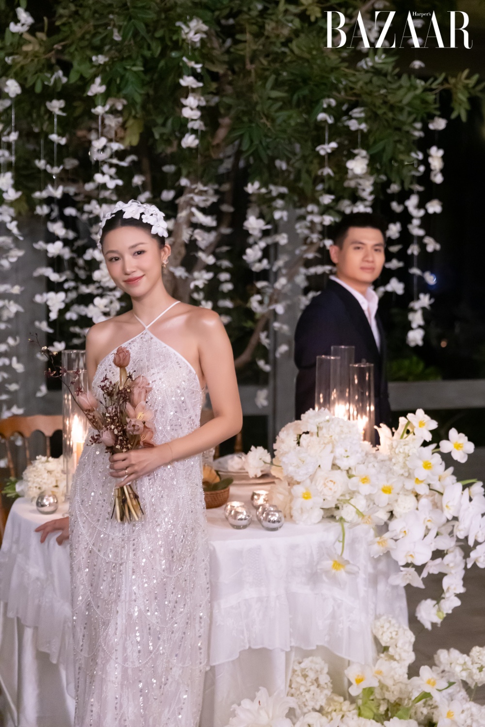 Salim diện đầm của NTK Adrian Anh Tuấn trong đêm tiệc. 